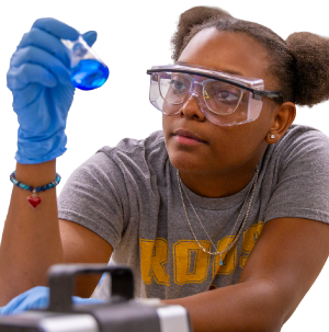 Cutout Image of a female student in a science lab working on something